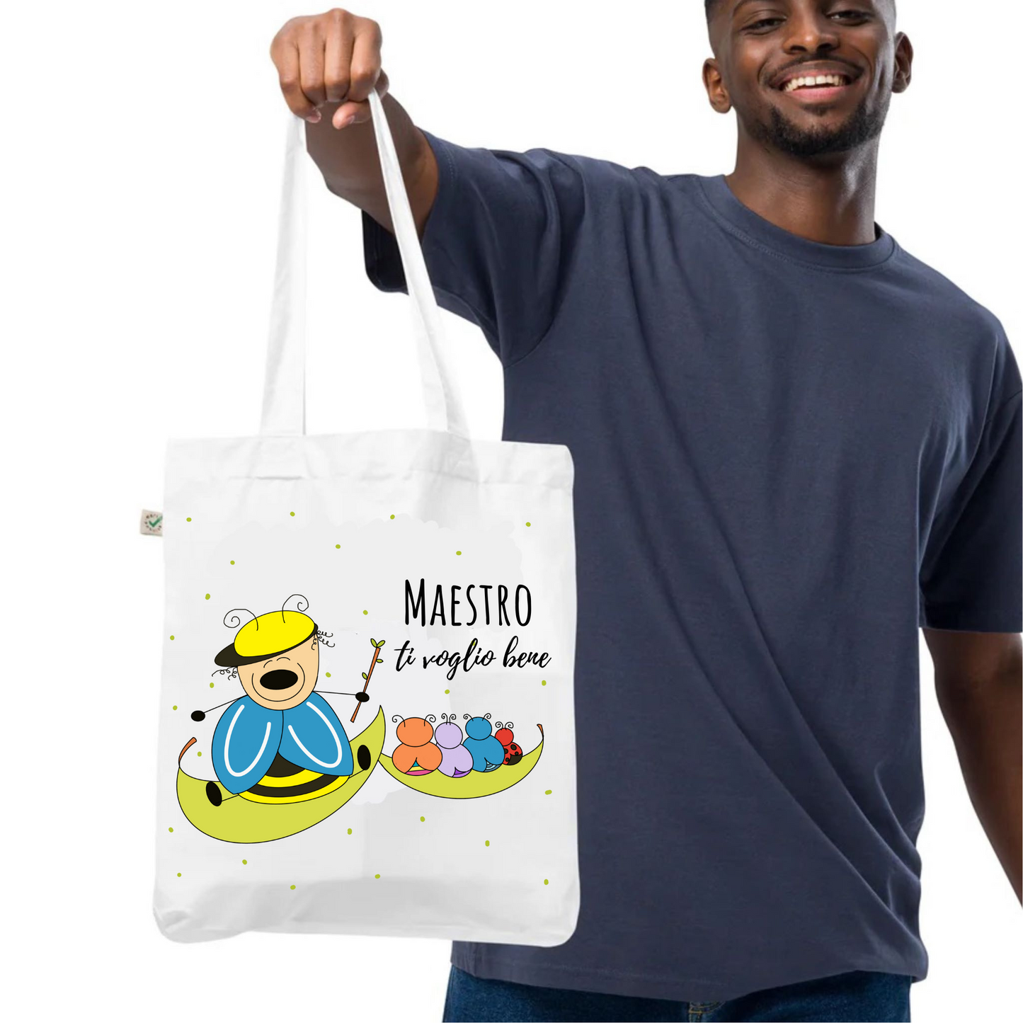 Borsa shopper con design di un buffo animaletto maestro e i suoi allievi, con la scritta "Maestro
ti voglio bene", ideale come regalo di fine anno per insegnanti e educatori.