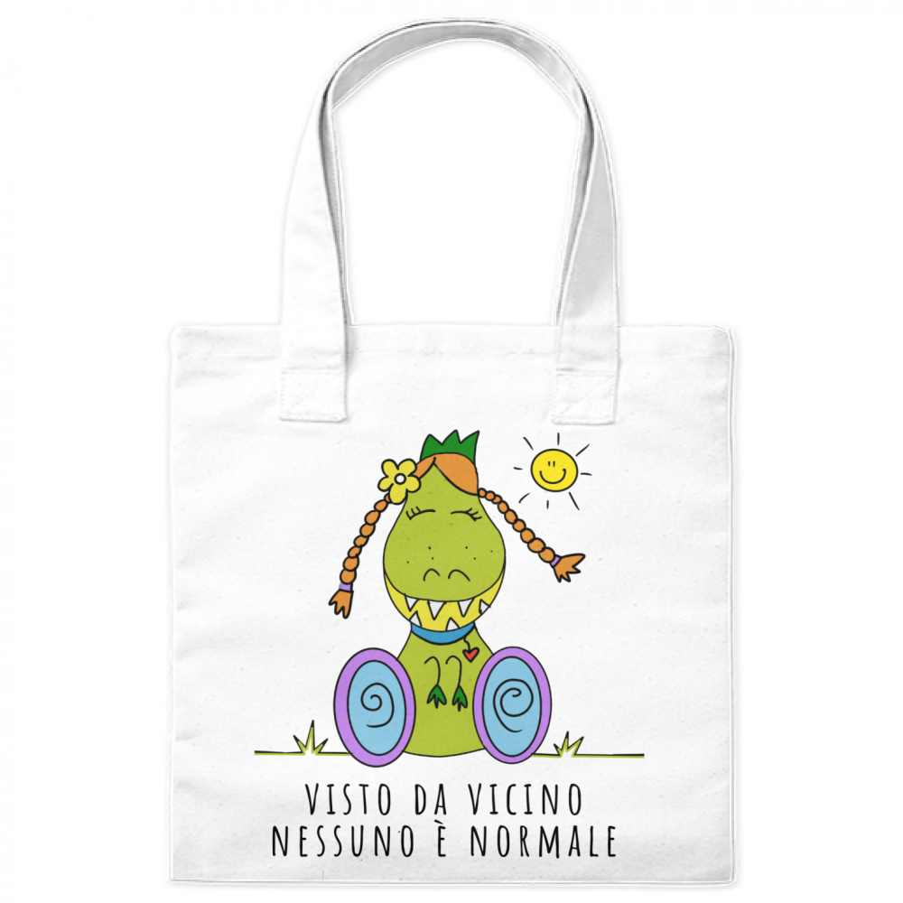 Borsa shopper con l'illustrazione di Dina, il dinosauro con disabilità, che porta un messaggio positivo di inclusione e accettazione.