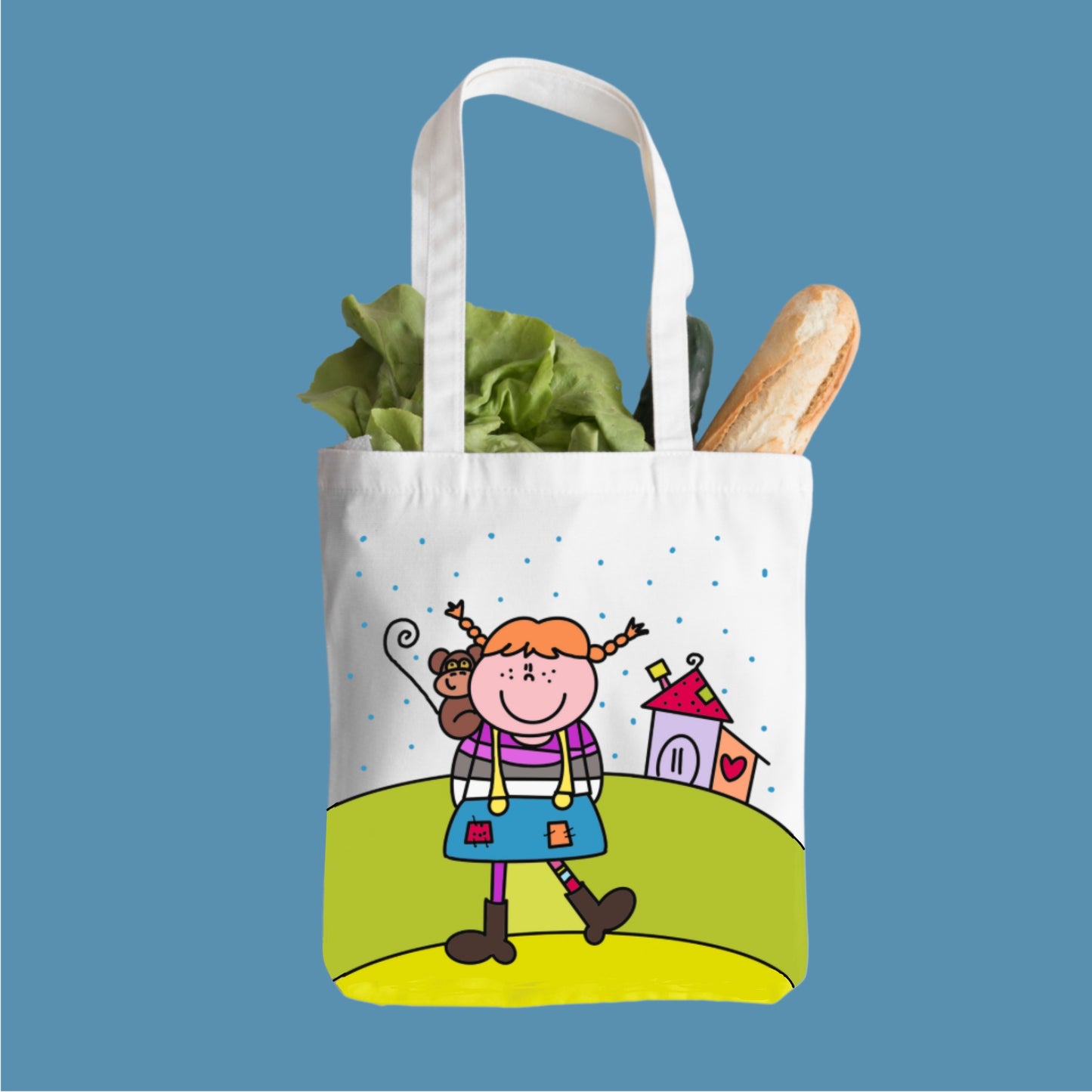 Shopper con illustrazione vivace di Pippi Calzelunghe, perfetta per la spiaggia, la scuola o per fare acquisti quotidiani, con un messaggio positivo e allegro.